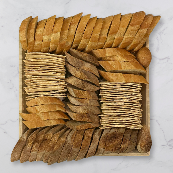 Image is a top down view of the Side Piece  bread and cracker platter.